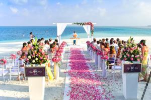 Beach wedding ceremony during the daytime